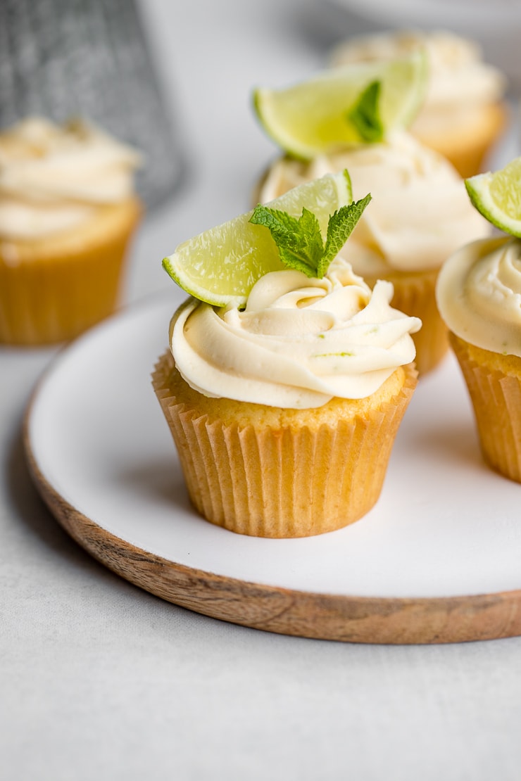 Mojito cupcake on a white plate.