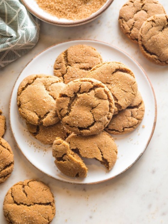 Small plate piled high with chewy ginger molasses cookies.