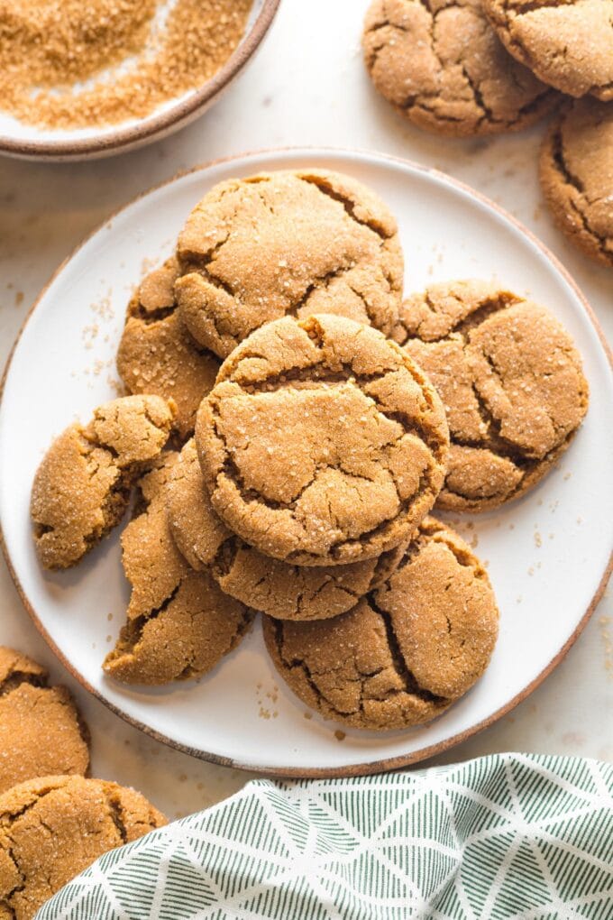 Small plate piled high with chewy ginger molasses cookies.