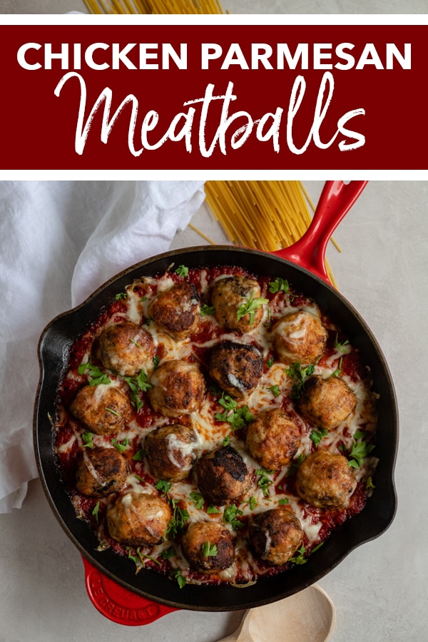 Meet the ultimate comfort food - mozzarella-STUFFED chicken Parmesan meatballs! Surprisingly easy to make and so delicious for a cozy meal with marinara sauce, more cheese, and pasta! #chickenparm #comfortfood