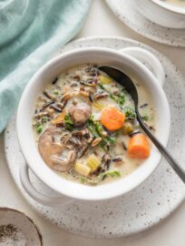 Small soup bowl filled with a creamy Instant Pot wild rice soup.