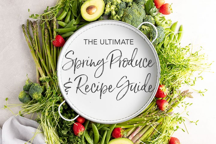 White tray surrounded by produce, with letters "The Ultimate Spring Produce and Recipe Guide"