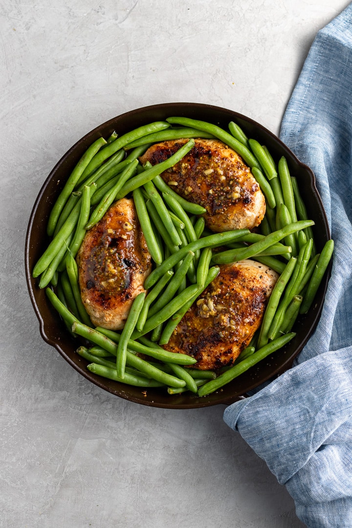 Honey mustard chicken skillet, ready to go in the oven.