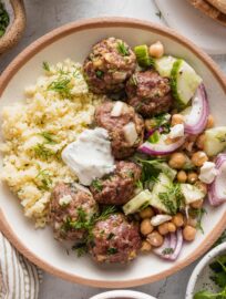 These Moroccan-inspired Lamb Meatballs are quick to make but tender, delicious, and a fun way to diversify your dinner routine with Mediterranean vibes. Plenty of herbs add flavor to the beef-lamb mixture, which then bakes in the oven for hands-off convenience. Serve with couscous or rice, your favorite veggies, and fresh pita for bonus points.