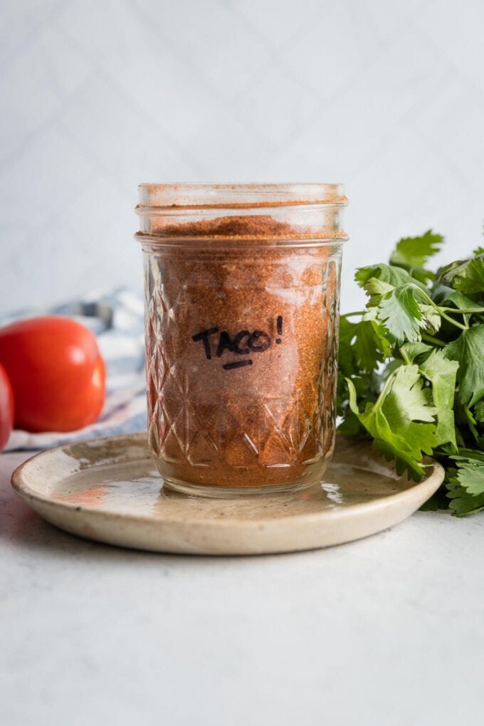 Small jar labeled "Taco!" holding homemade taco seasoning.