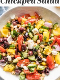 This easy and versatile chopped Greek Chickpea Salad takes less than 20 minutes to make and is packed with vibrant Mediterranean flavors. Loaded with crunchy bell peppers and cucumbers, briny olives, creamy Feta, and a light homemade vinaigrette, you’ll love this as a side, lunch, or dish to share.