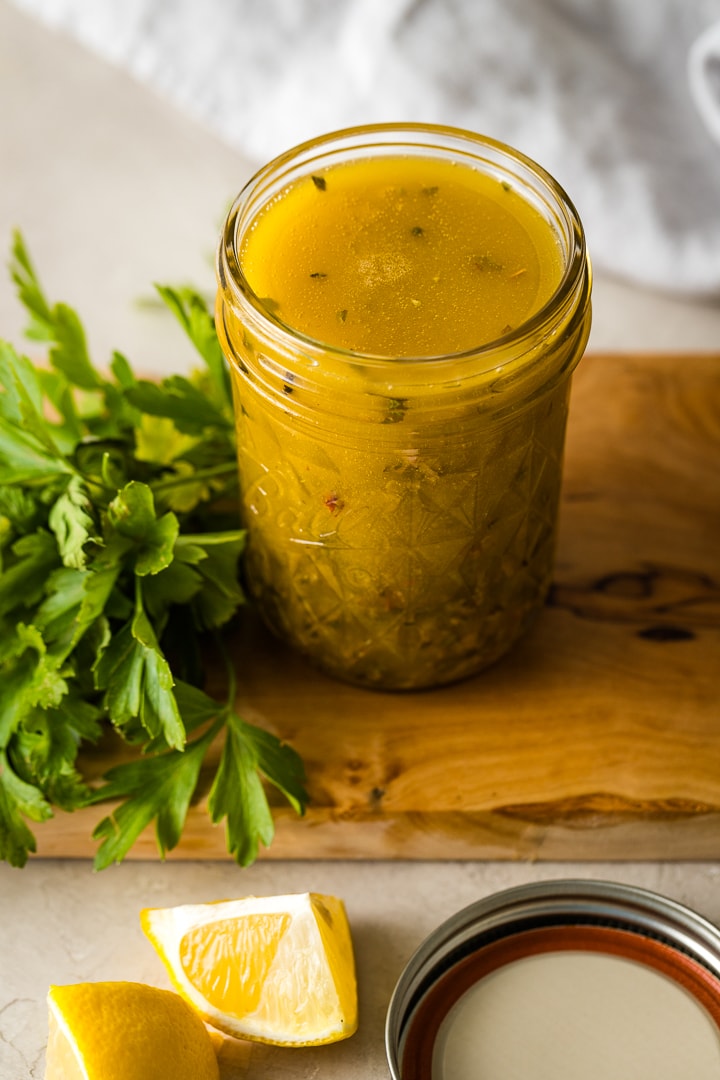 Jar of homemade Italian salad dressing.