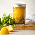 Jar of homemade Italian salad dressing.