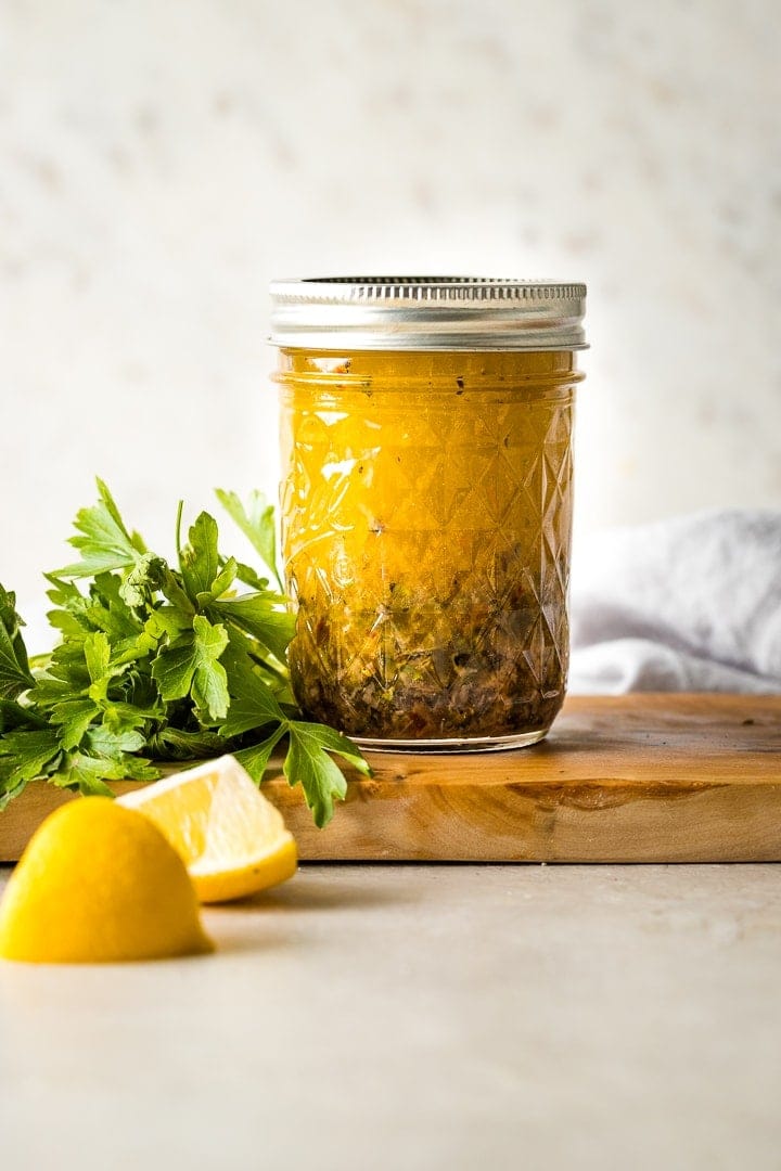 Jar of homemade Italian salad dressing.