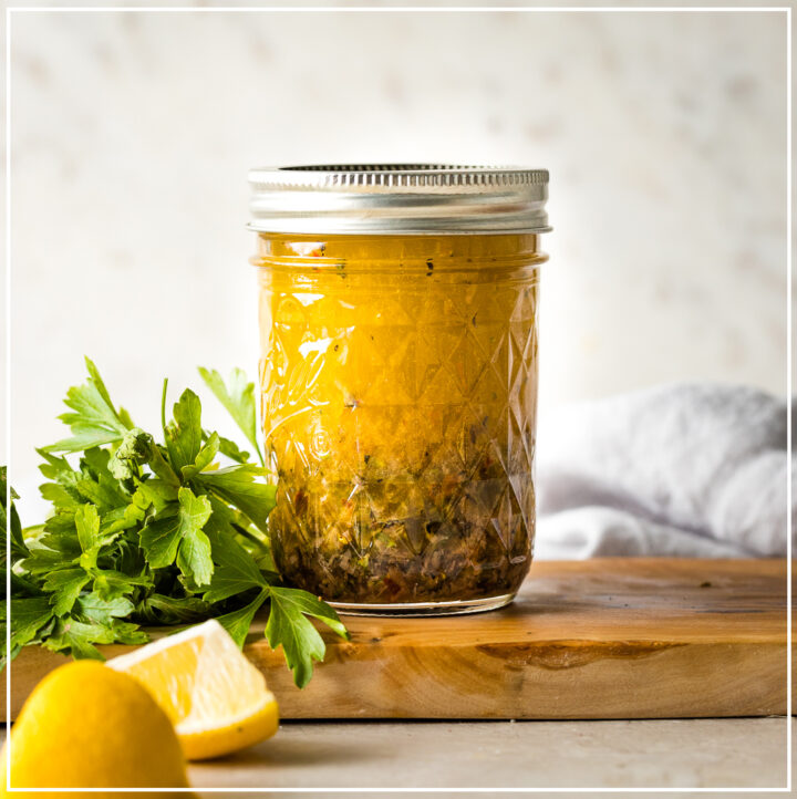 Jar of homemade Italian salad dressing.