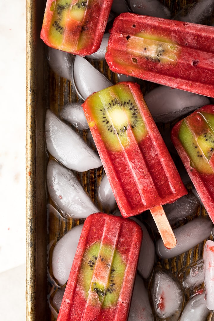 Close-up of a strawberry kiwi popsicle.