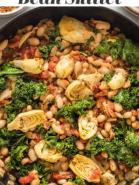 Spice up your dinner routine with this easy Tuscan white bean skillet. Ready in under 30 minutes, perfect with a crusty loaf of bread! A delicious, easy dinner recipe that happens to be casually vegan.