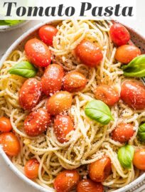 This easy roasted tomato pasta is absolutely delicious and takes just 6 ingredients and about 20 minutes. Al dente pasta is tossed with sweet blistered cherry tomatoes, slivered garlic, and a luscious-yet-light sauce everyone will love.