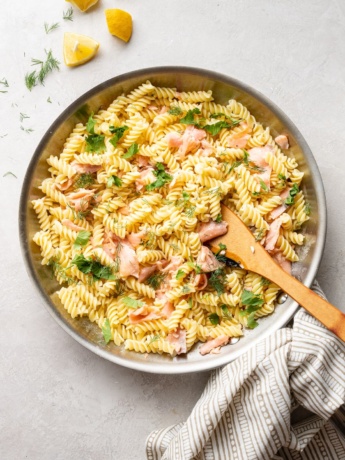 Large skillet filled with Creamy Smoked Salmon Pasta.