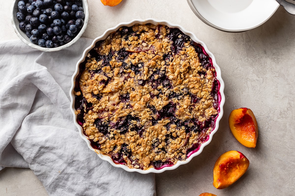 A large blueberry nectarine crisp with buttery oat topping.