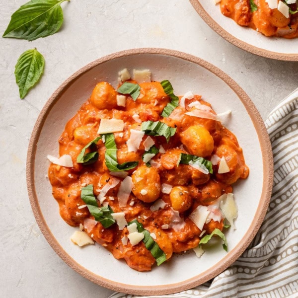Bowls filled with gnocchi alla vodka.