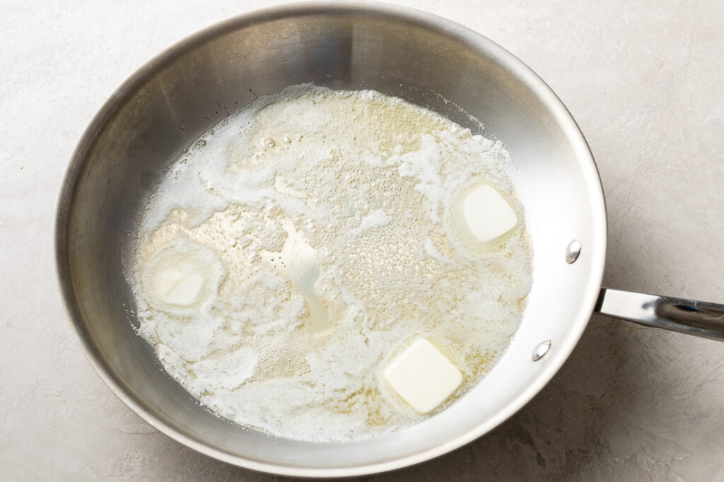 Butter melted in a large skillet.