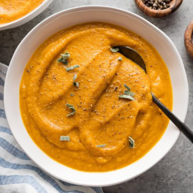 Bowl of velvety roasted butternut squash soup.