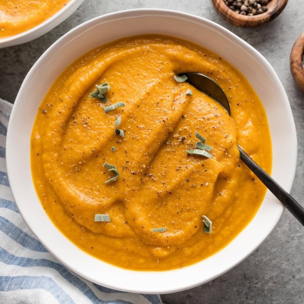 Bowl of velvety roasted butternut squash soup.