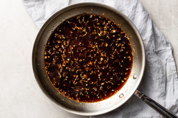 A pan simmering the sauce for Mongolian beef.