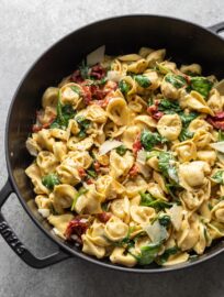 One pan creamy Tuscan tortellini with spinach and sun-dried tomatoes.
