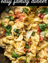 This creamy Tuscan tortellini is flavorful, quick, and super simple! One pan and 20 minutes transform store-bought tortellini into a gourmet meal with sun-dried tomatoes, spinach, garlic, and cream.