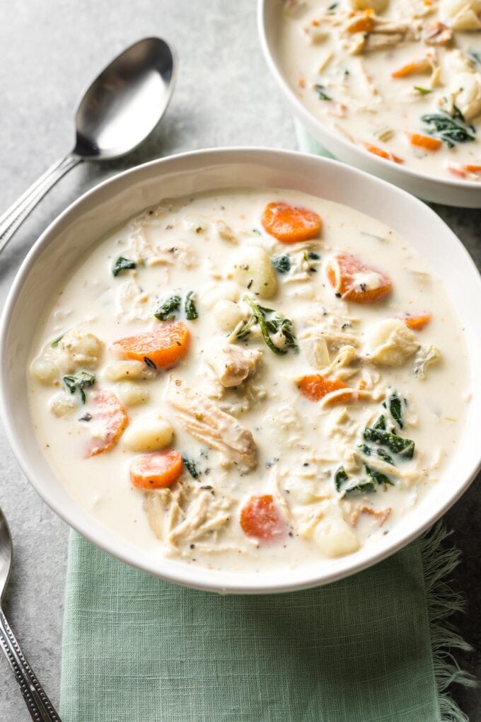 Close-up of a bowl of creamy crockpot chicken gnocchi, a perfect Olive Garden copycat.