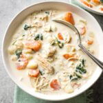 Bowls of creamy crockpot chicken gnocchi, a perfect Olive Garden copycat.