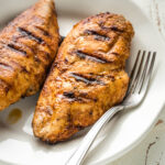 Juicy grilled chicken breasts seasoned with a homemade dry rub.