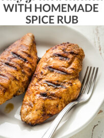 This easy grilled chicken uses a simple homemade dry rub to lock in incredible flavor with no fuss for the best BBQ chicken you've had in your life!