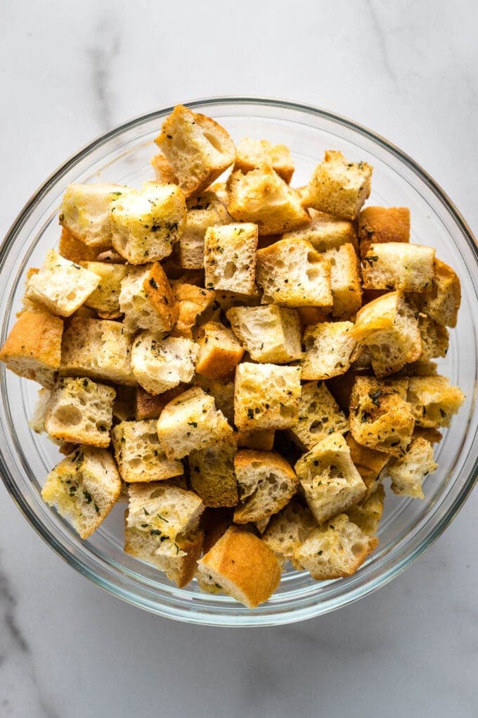Close-up of crunchy croutons in a prep bowl.