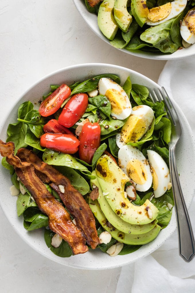 Close-up of salad with dressing drizzled on top.