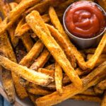 Close-up of crispy sweet potato fries.