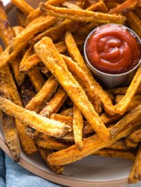 Close-up of crispy sweet potato fries.