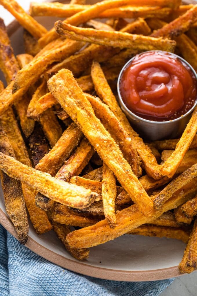 Close-up of crispy sweet potato fries.