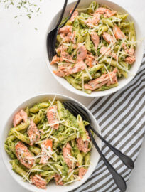 This salmon pesto pasta recipe is delicious and simple to make! It uses a handful of everyday ingredients and is an easy, comforting, and healthy dinner.