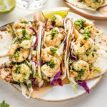 Shrimp tacos with green chile adobo.