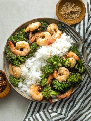 Bowl of white rice, broccoli, and honey garlic shrimp.