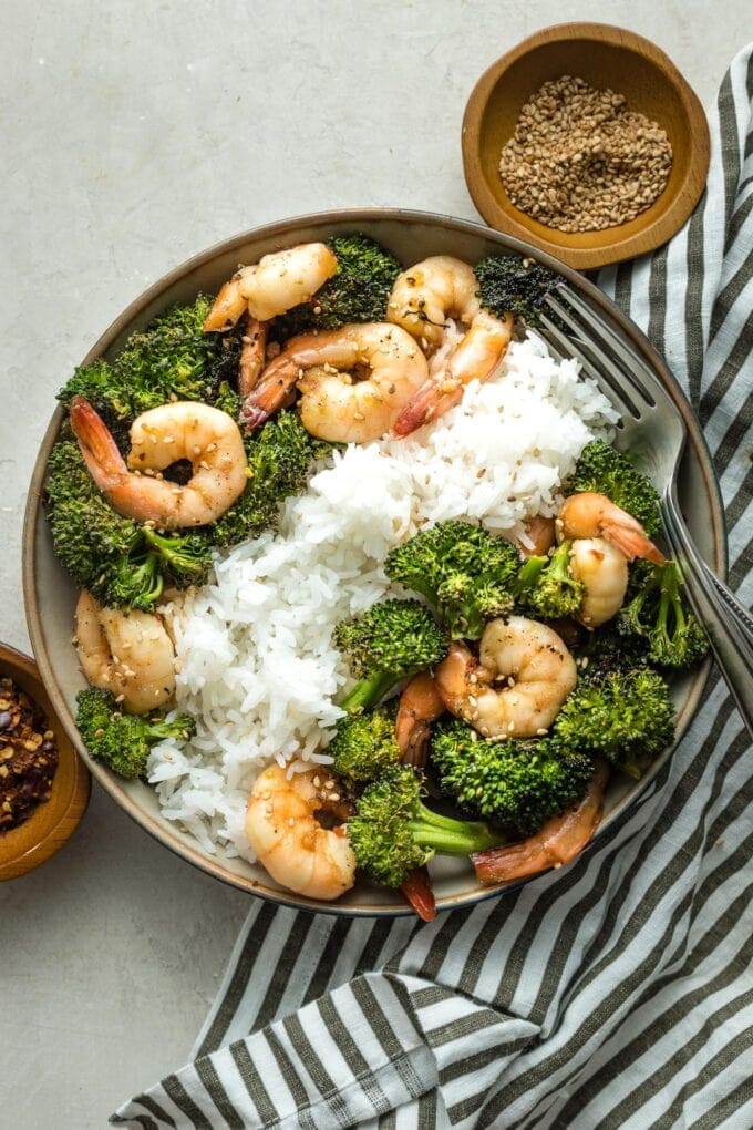 Bowl of white rice, broccoli, and honey garlic shrimp.