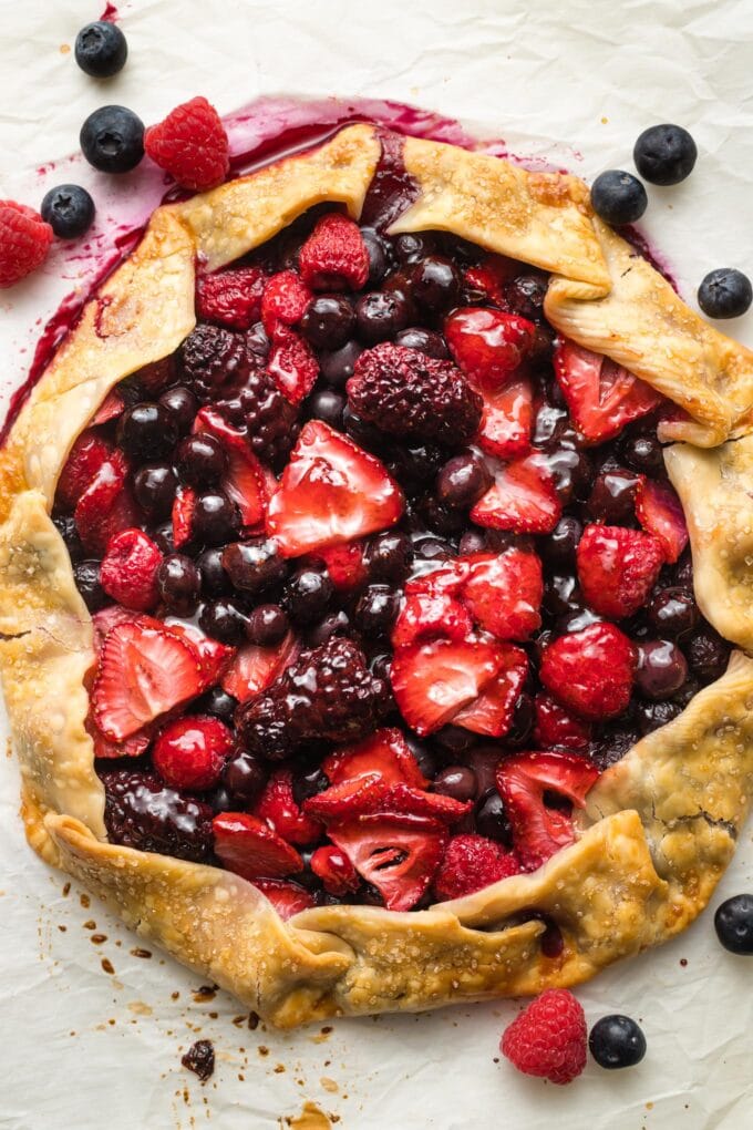 Glossy, just-baked mixed berry galette.
