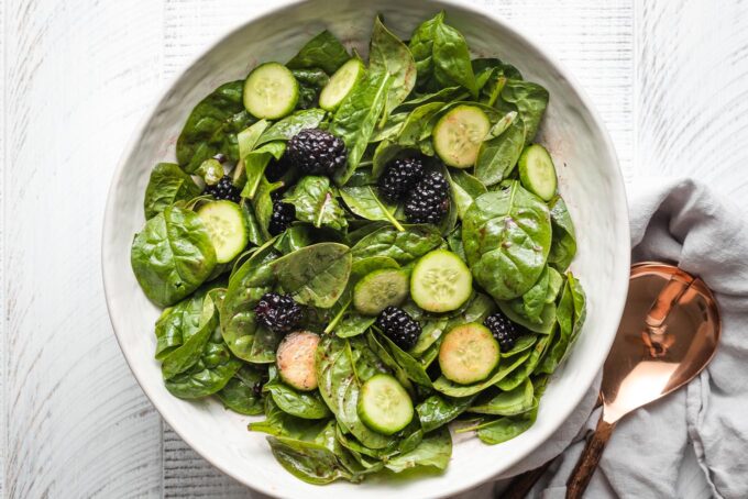 Veggies and fruit tossed in dressing.