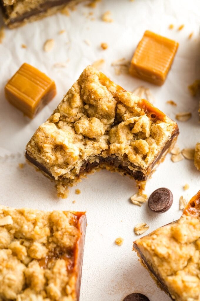 Close-up of a carmelita bar with one bite taken out.