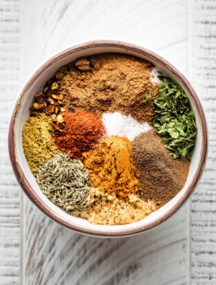 Individual herbs in a small prep bowl.