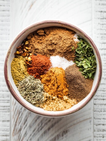 Individual herbs in a small prep bowl.