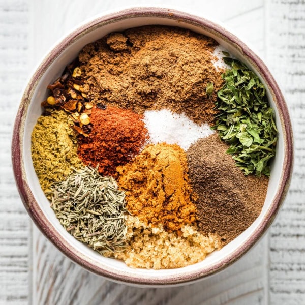 Individual herbs in a small prep bowl.