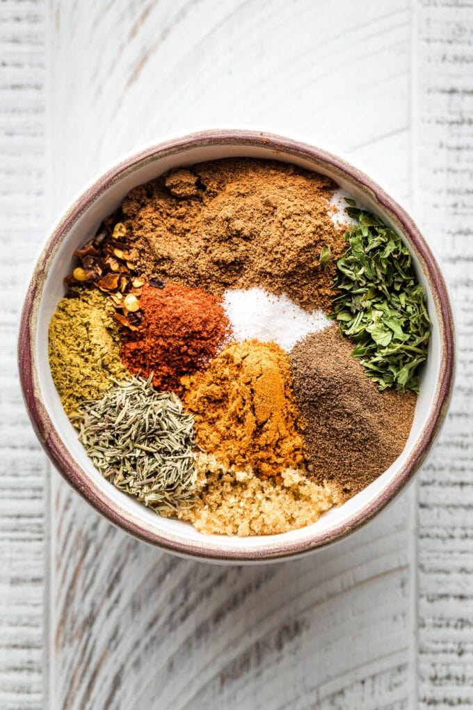 Individual herbs in a small prep bowl.