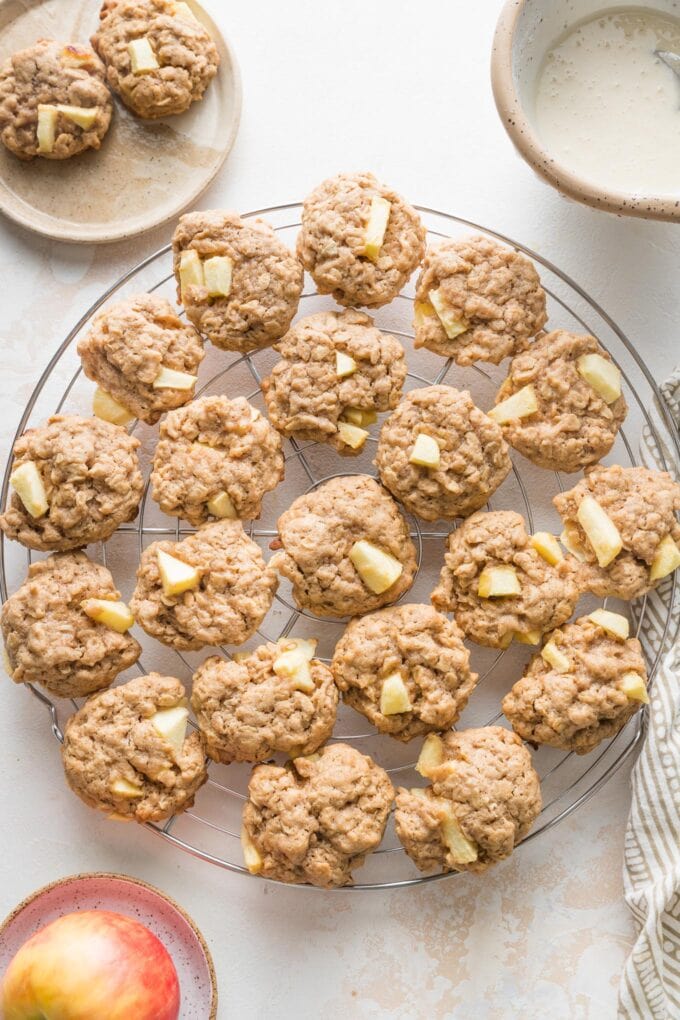 Apple cinnamon cookies without glaze cooling on a round wire cooling rack.