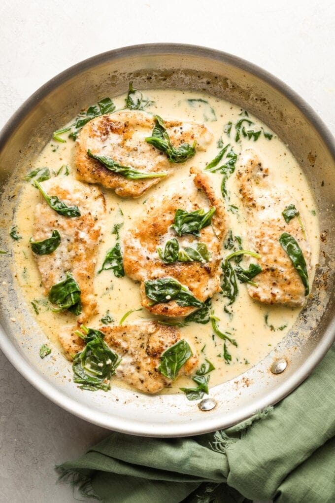 Creamy chicken Florentine, in a skillet ready to serve.