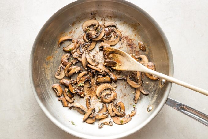 Mushrooms browned in the skillet.