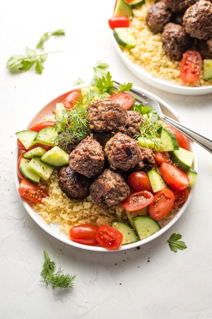 Za'atar-spiced lamb meatballs on a plate.